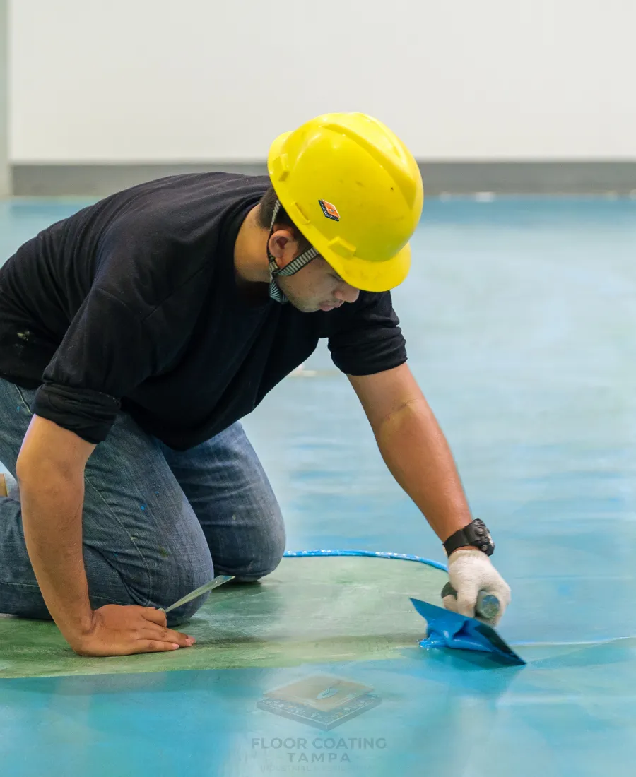 Industrial-grade base coat application for polyaspartic flooring